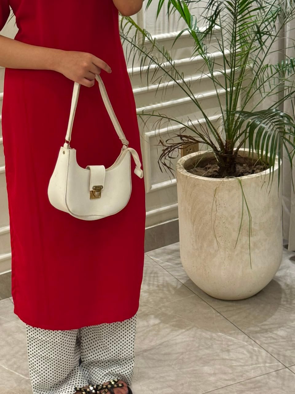 Polka dots trouser with red shirt